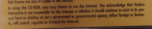 A warning: "In using this CD-ROM, you may choose to use the Internet. You acknowledge that Hasbro Interactive is not responsible for the Internet or whether it should continue to exist in its present form or whether or not a government or governmental agency, either foreign or domestic, will control, regular, or disband the Internet."